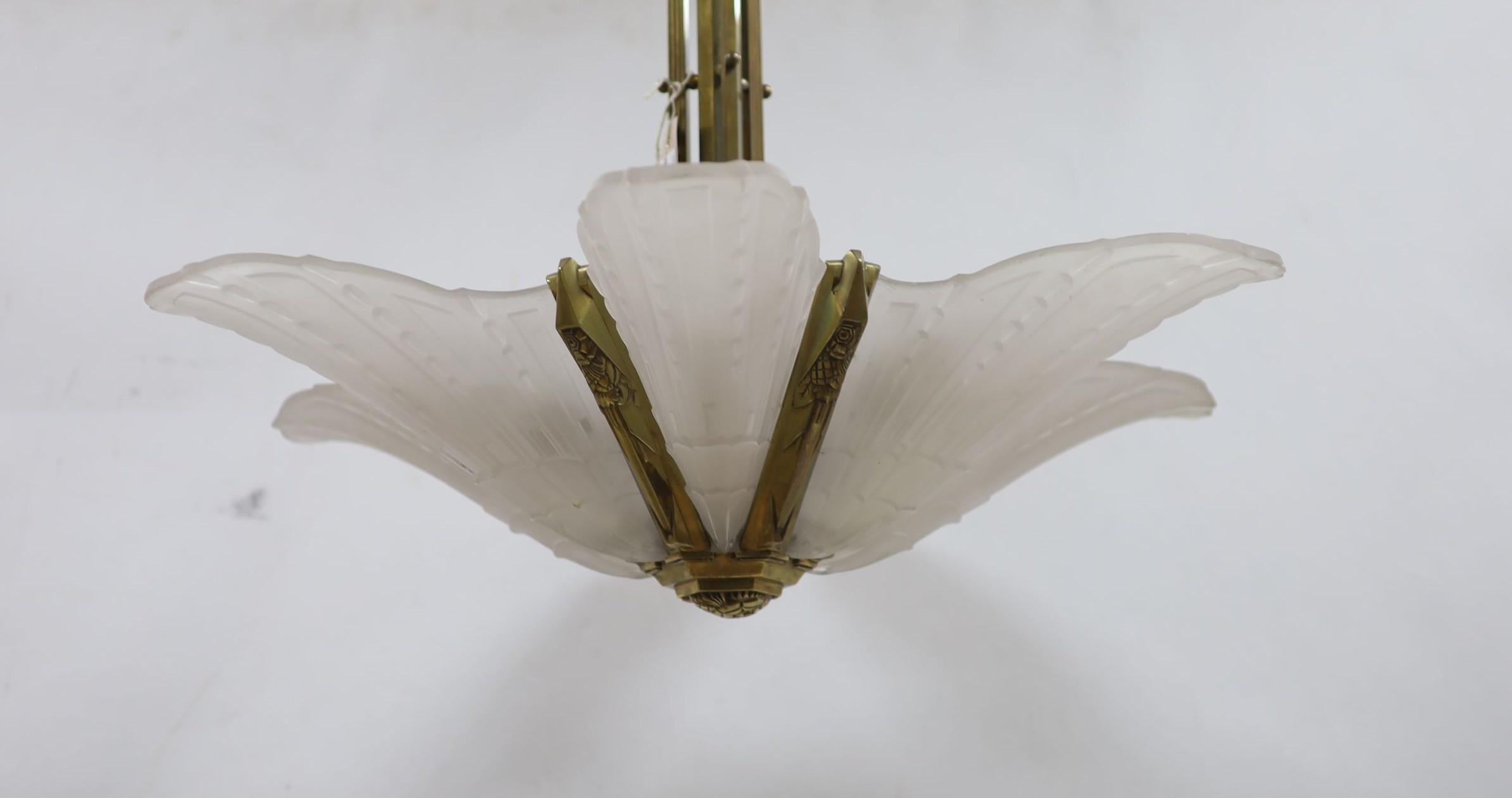 An Art Deco style large frosted glass and brass handing ceiling light 80cm drop